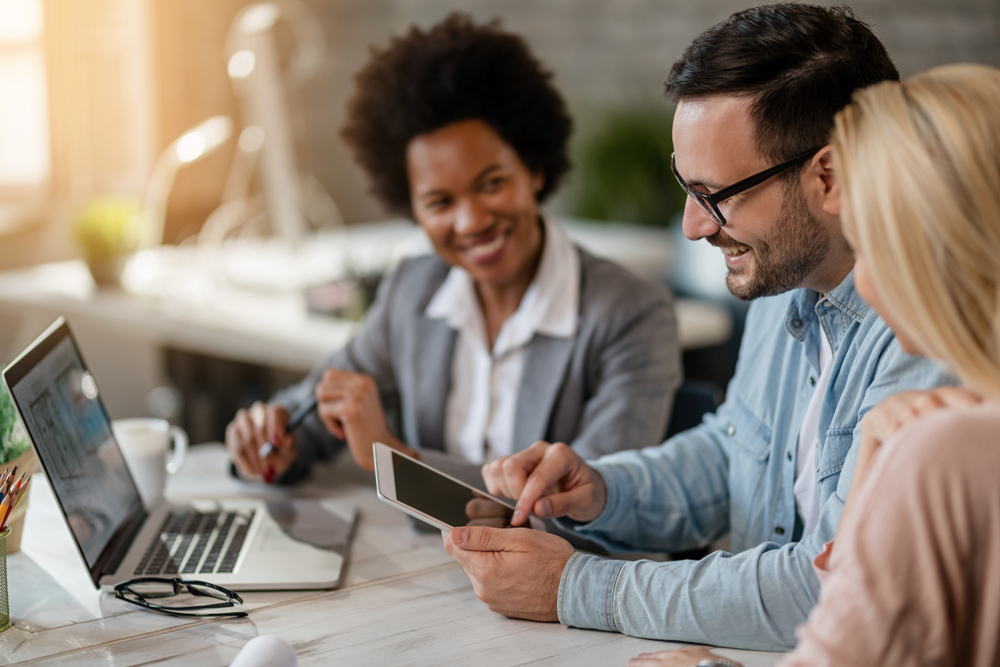 Housing provider helping applicants complete a rental application